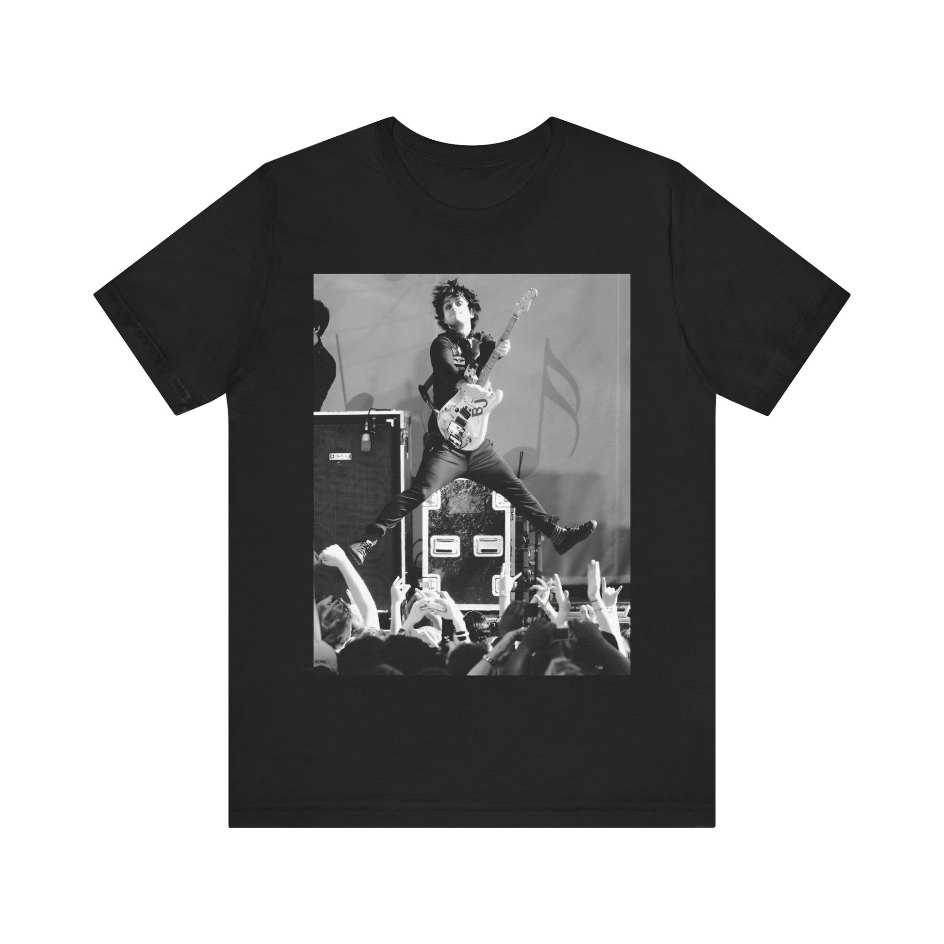 A black graphic t-shirt featuring a graphic of Billie Joe Armstrong from Green Day jumping on stage during a performance.