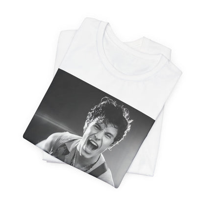 A black graphic t-shirt featuring a black and white photo of Shawn Mendes, emphasizing his charm.