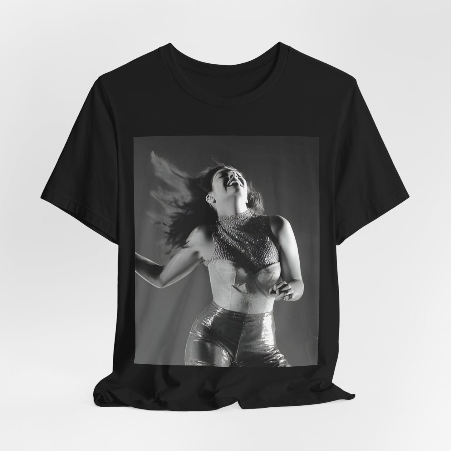 A black graphic t-shirt featuring a black and white, monochrome graphic or portrait of Lorde.