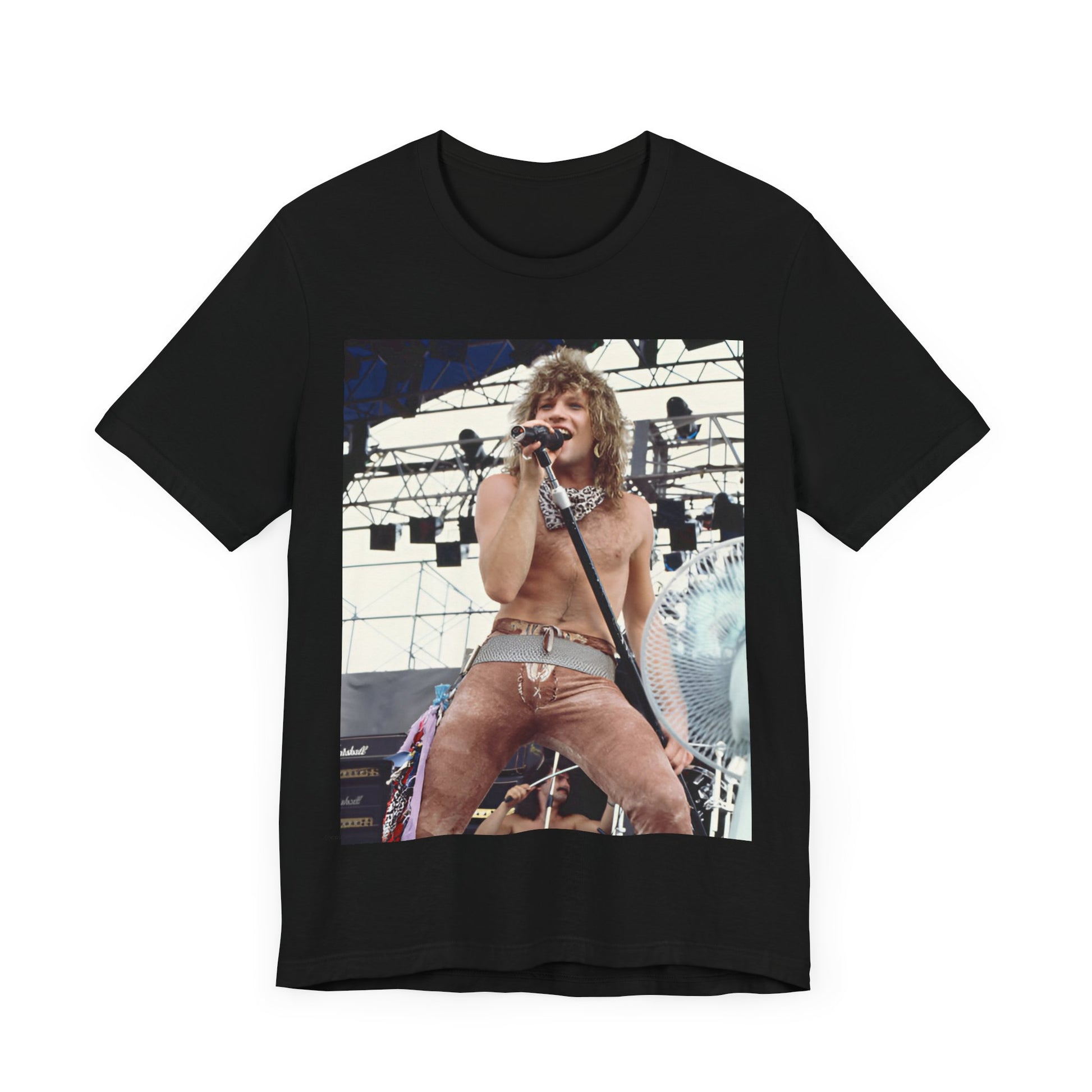 A black graphic t-shirt featuring a dynamic graphic or photo of Bon Jovi performing live on stage with a fierce intensity.