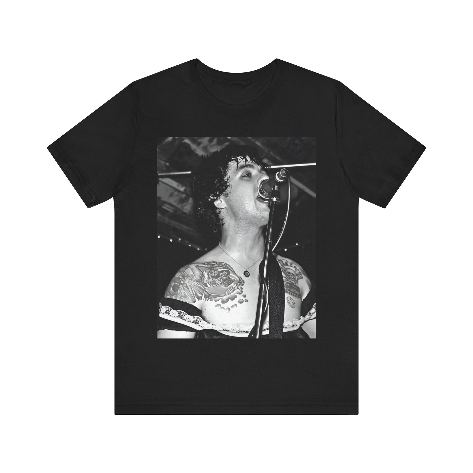 A black graphic t-shirt featuring a black and white graphic or photo of Green Day performing live on stage.