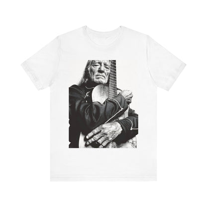 A black graphic t-shirt featuring a vintage country legend graphic of Willie Nelson.
