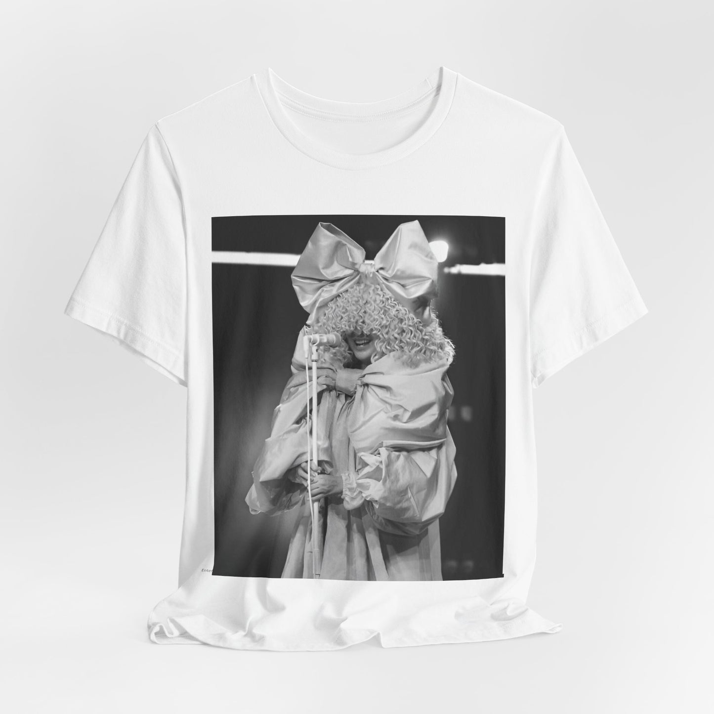 A black graphic t-shirt featuring a black and white, monochrome graphic or photo of Sia.