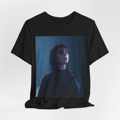 A direct, powerful portrait of Billie Eilish, embodying the 'HIT ME HARD AND SOFT' album era, printed on a graphic t-shirt.