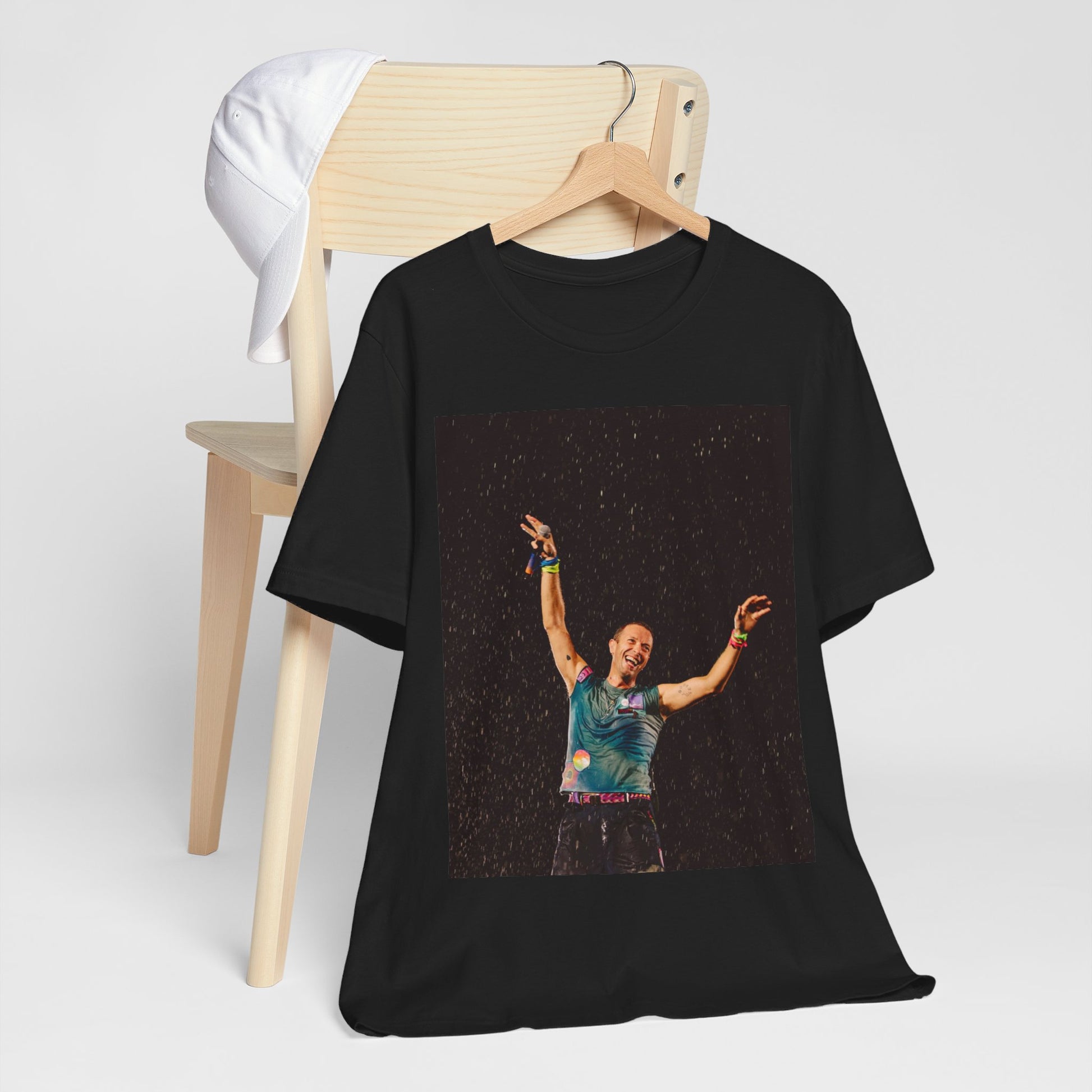 A black graphic t-shirt featuring a graphic related to Coldplay's song 'Fix You'.