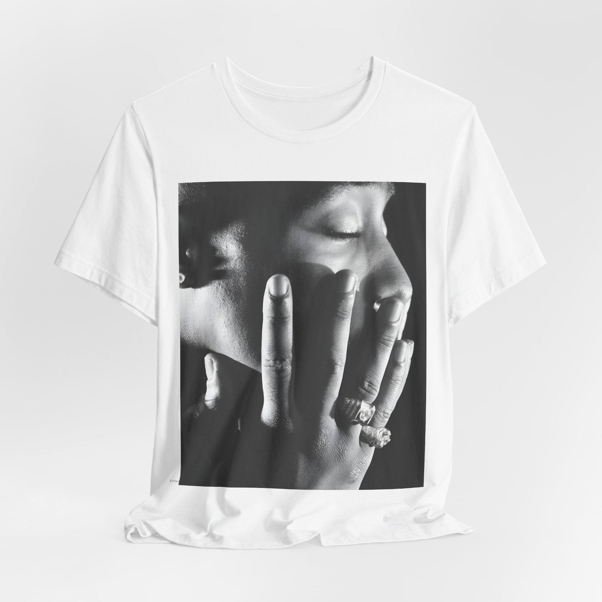 A black graphic t-shirt featuring an iconic West Coast swag graphic of Tupac.