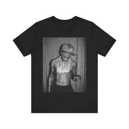 A black graphic t-shirt featuring a graphic of Travis Scott as the Houston rap king.