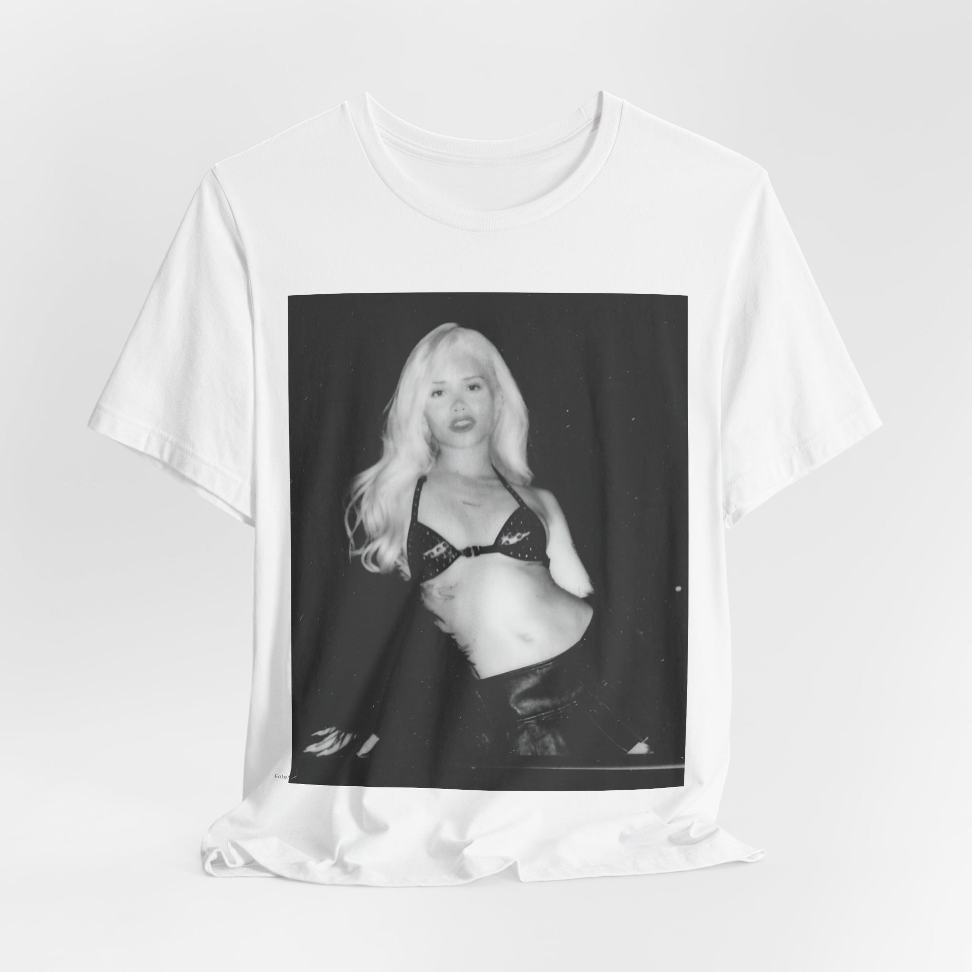 A black graphic t-shirt featuring a black and white portrait photo of Nessa Barrett.