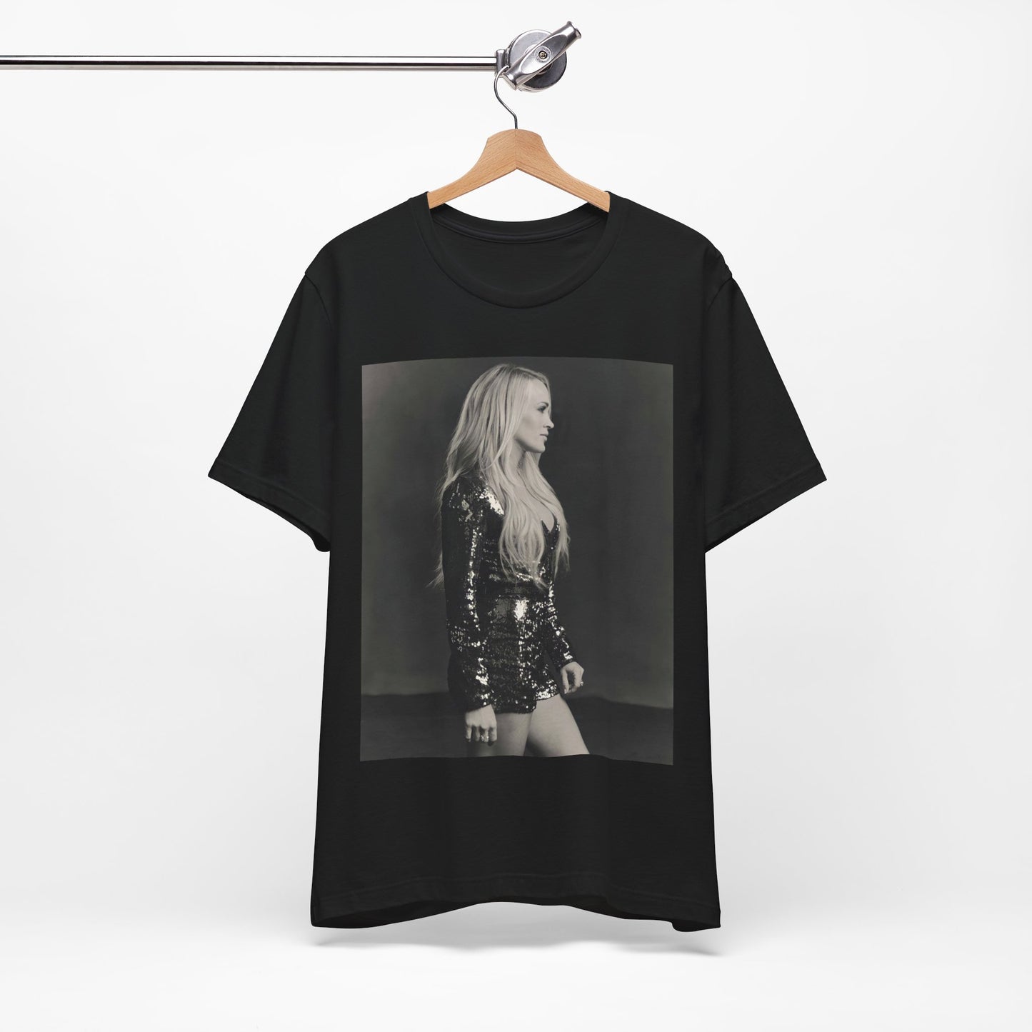 A black graphic t-shirt featuring a black and white photo of Carrie Underwood performing live on stage.