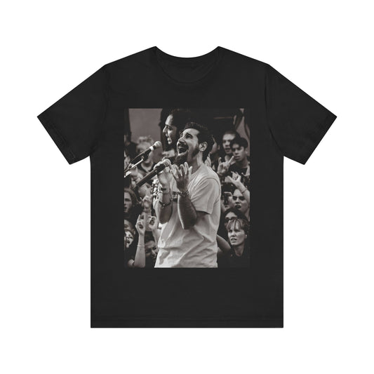 A black graphic t-shirt featuring a black and white portrait photo of Serj Tankian from System of a Down.