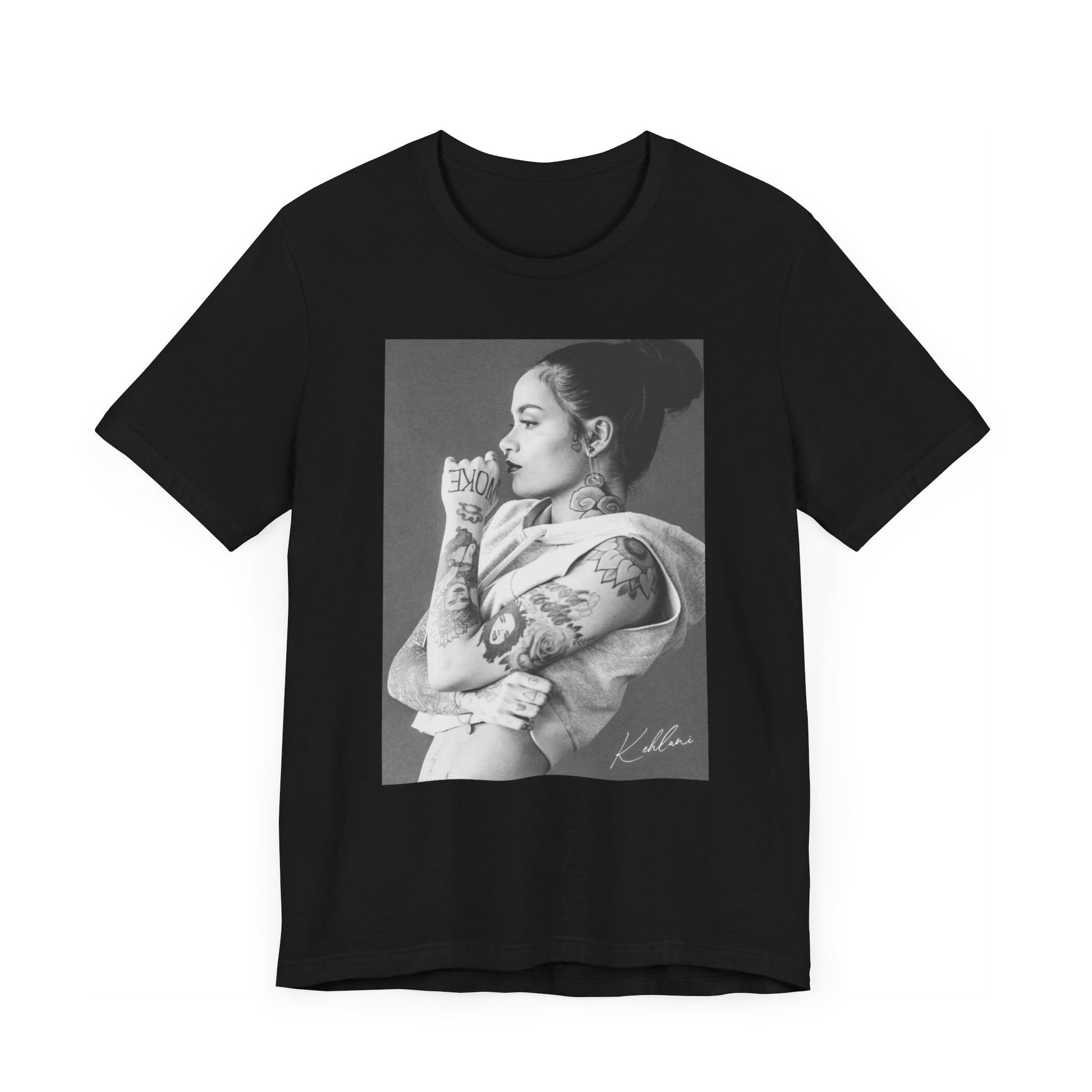 A black graphic t-shirt featuring a black and white, monochrome graphic or photo of Kehlani.