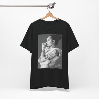 A black graphic t-shirt featuring a black and white, monochrome graphic or photo of Kehlani.