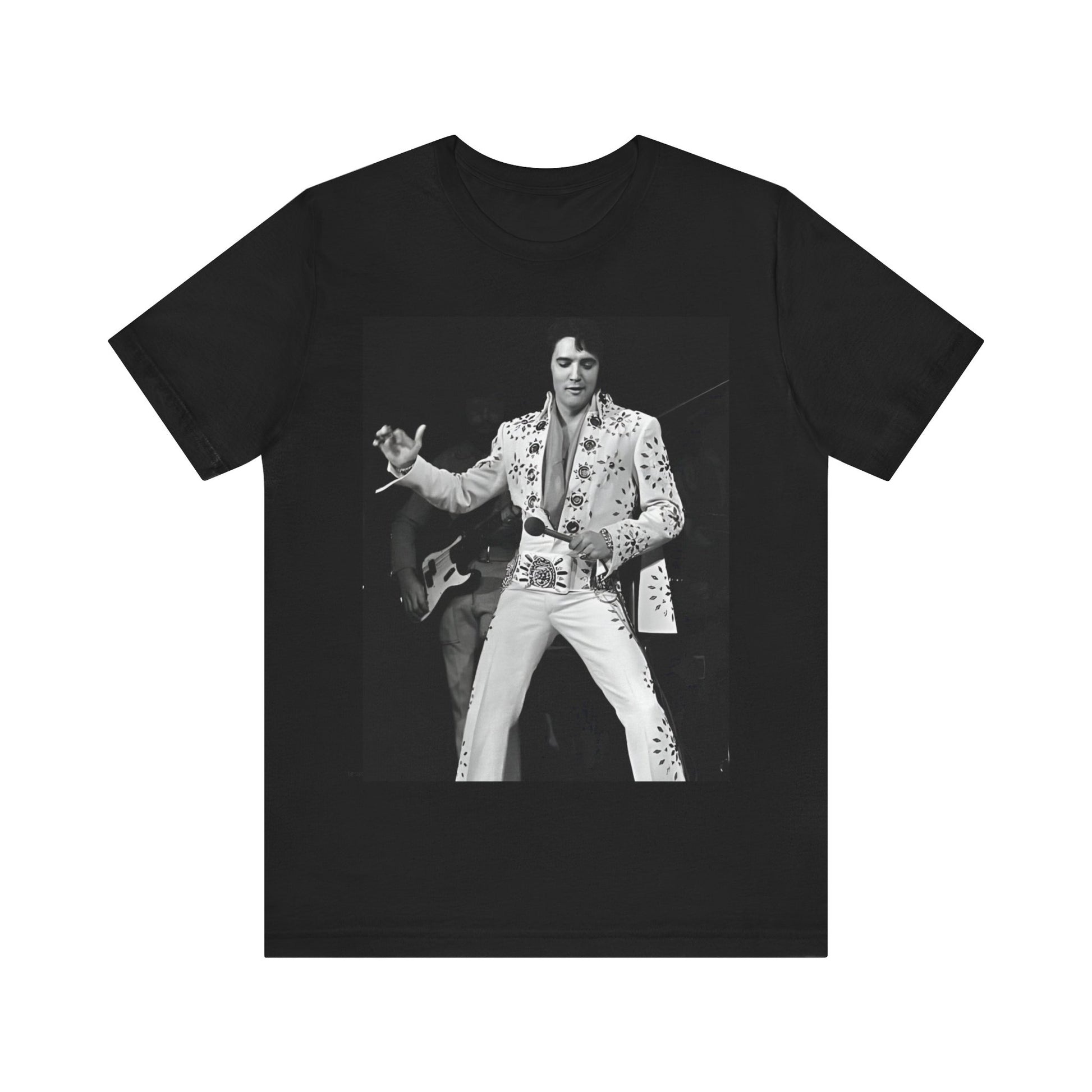 A black graphic t-shirt featuring a stylized graphic of Elvis Presley as The King of Rock 'n' Roll.