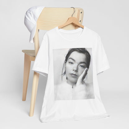 A black graphic t-shirt featuring a graphic related to Bjork's 'Post' album era, possibly with album art elements.