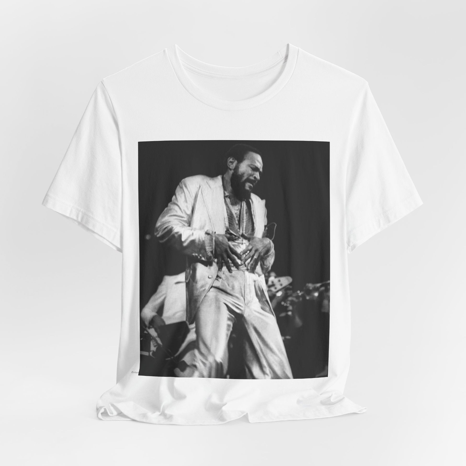 A black graphic t-shirt featuring a 70s Motown concert graphic of Marvin Gaye.