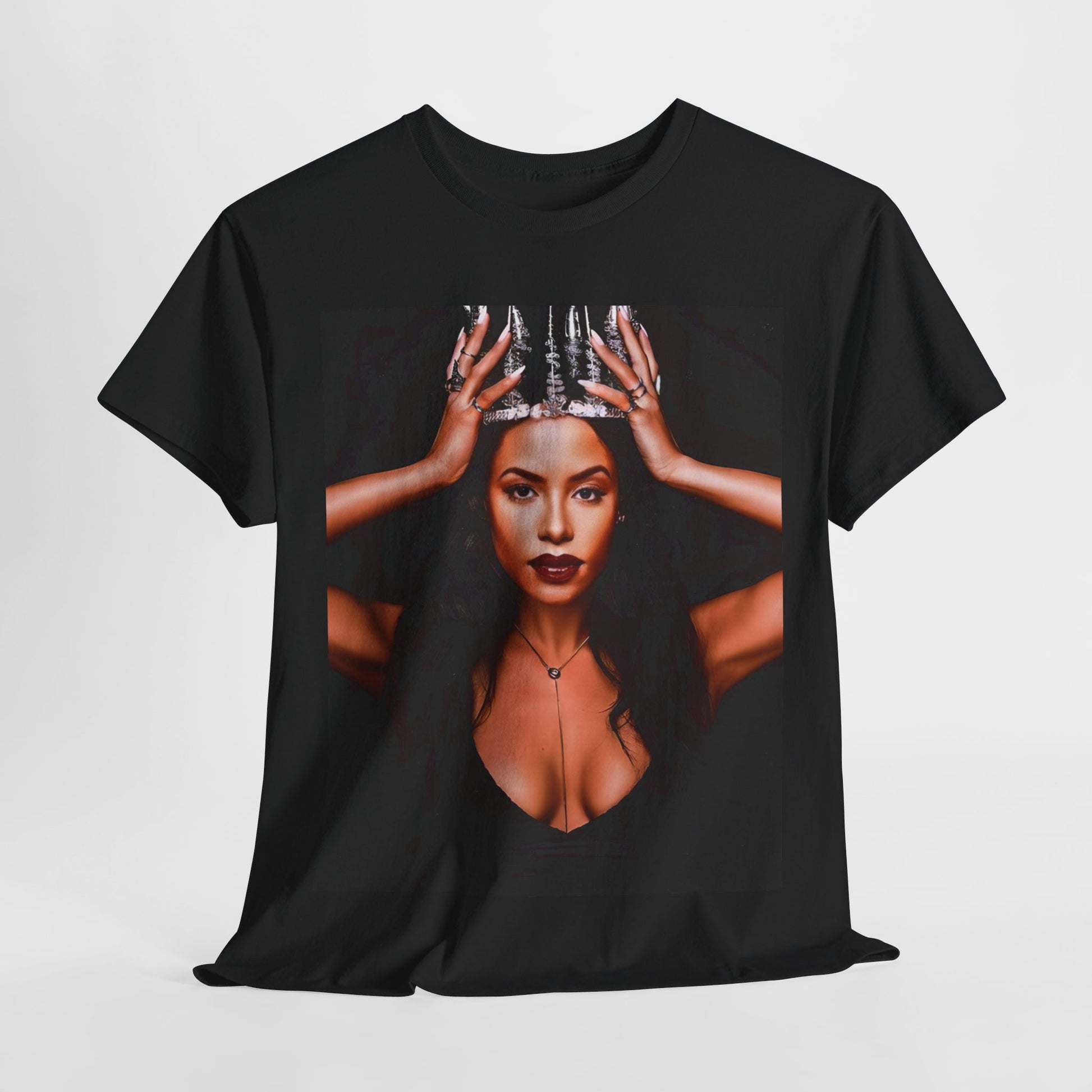 A black graphic t-shirt featuring a boxy graphic related to Aaliyah's 'More Than a Woman' song or era.