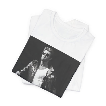 A black graphic t-shirt featuring a retro black and white monochrome graphic or photo of George Michael.