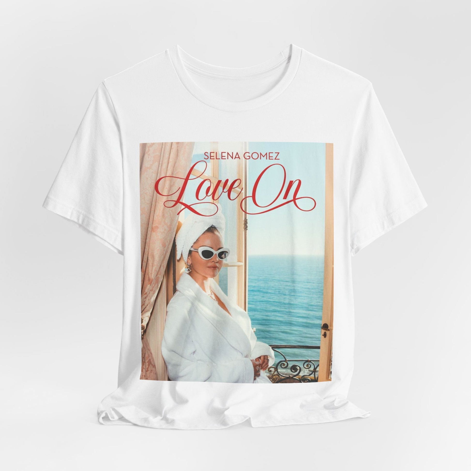 A black graphic t-shirt featuring a graphic related to Selena Gomez's 'Love On' song.