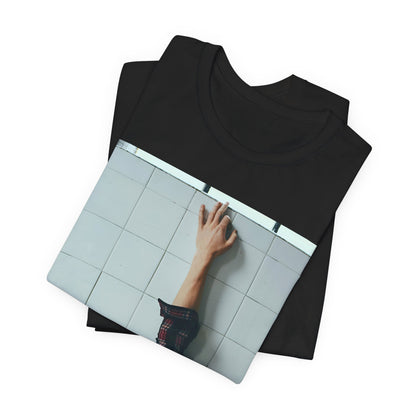 A black graphic t-shirt featuring a bold graphic of Shawn Mendes as a superstar.