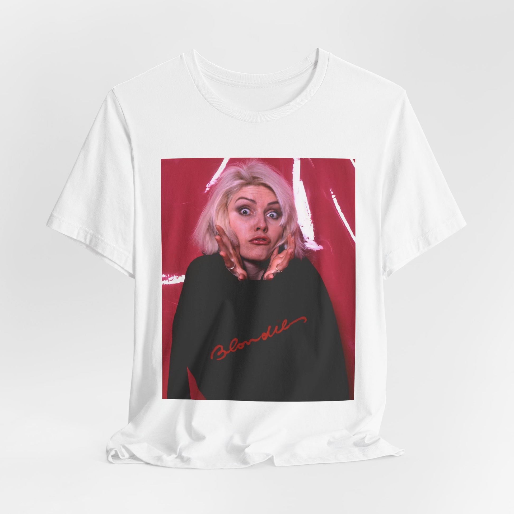 A black graphic t-shirt featuring a graphic related to Blondie's 'Atomic' song or era.