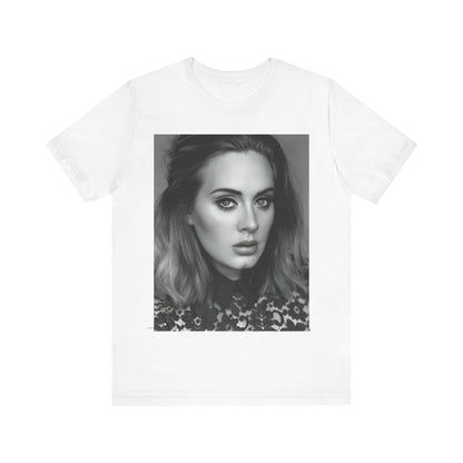 A black graphic t-shirt featuring a classic black and white, monochrome portrait of Adele, showing her with a serene or thoughtful expression.