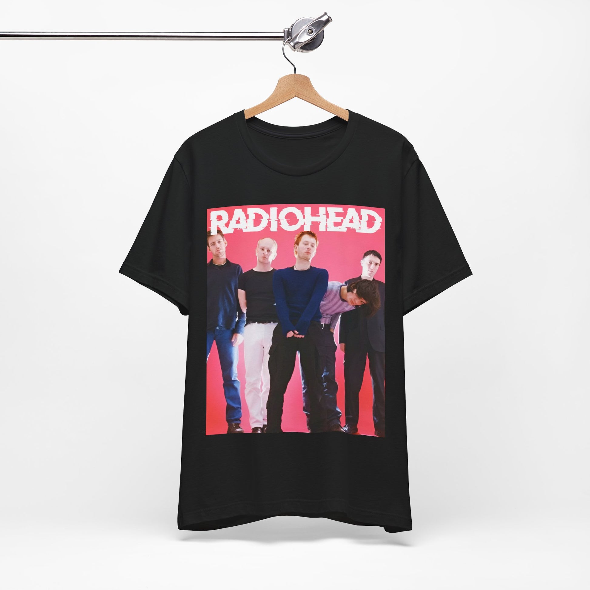 A black graphic t-shirt featuring a 90s alternative aesthetic graphic of Radiohead.