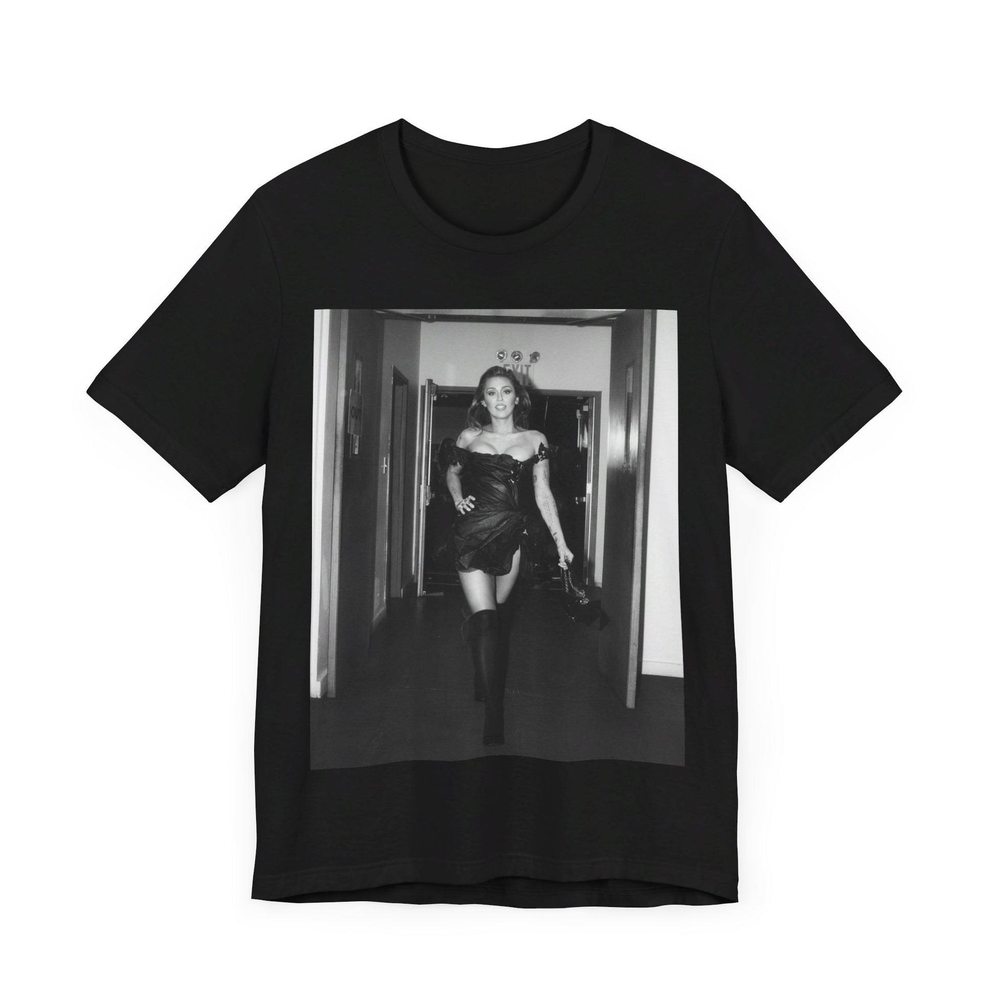 A black graphic t-shirt featuring a black and white graphic of Miley Cyrus in a cool pop rock style.