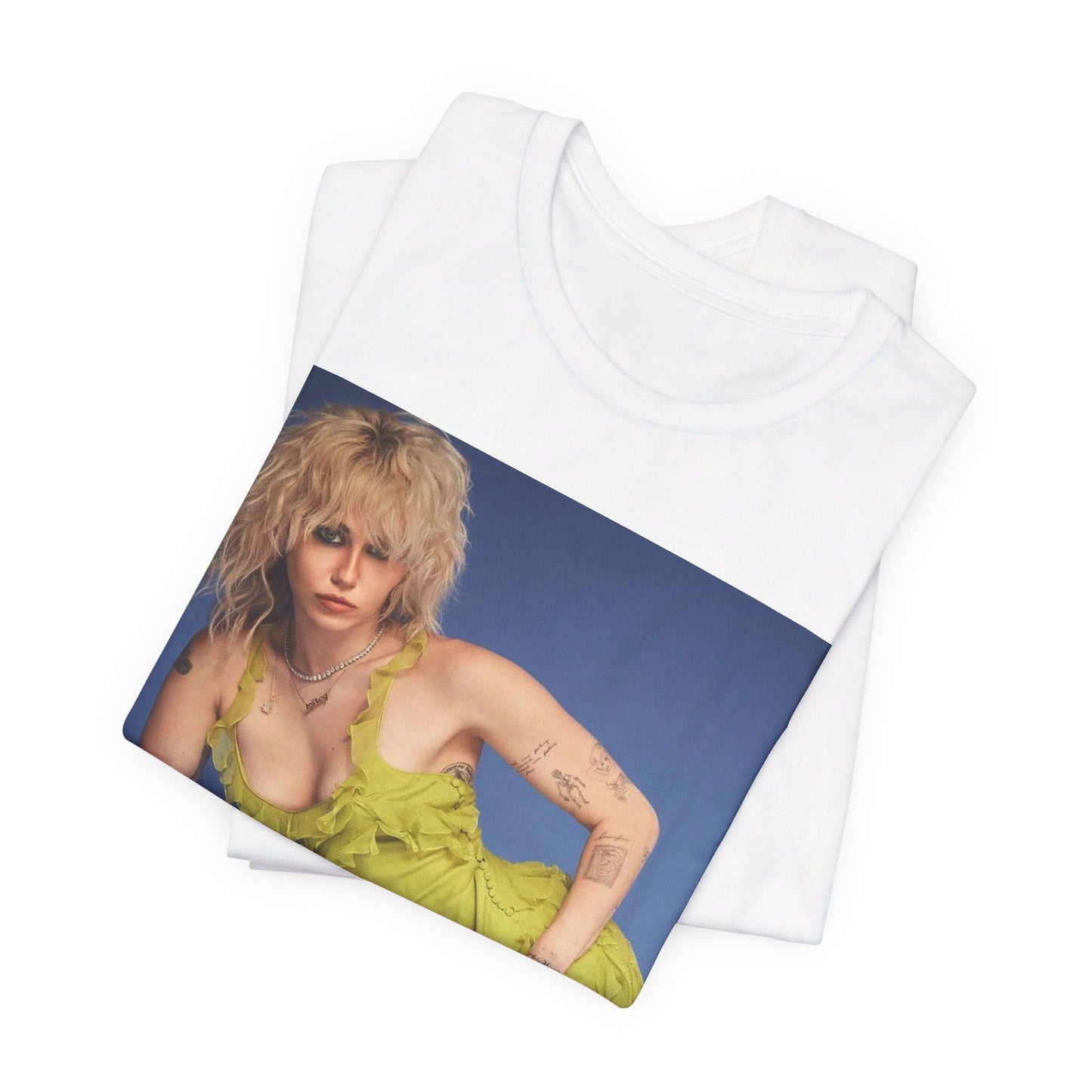 A black graphic t-shirt featuring a graphic of Miley Cyrus as a global pop phenomenon.