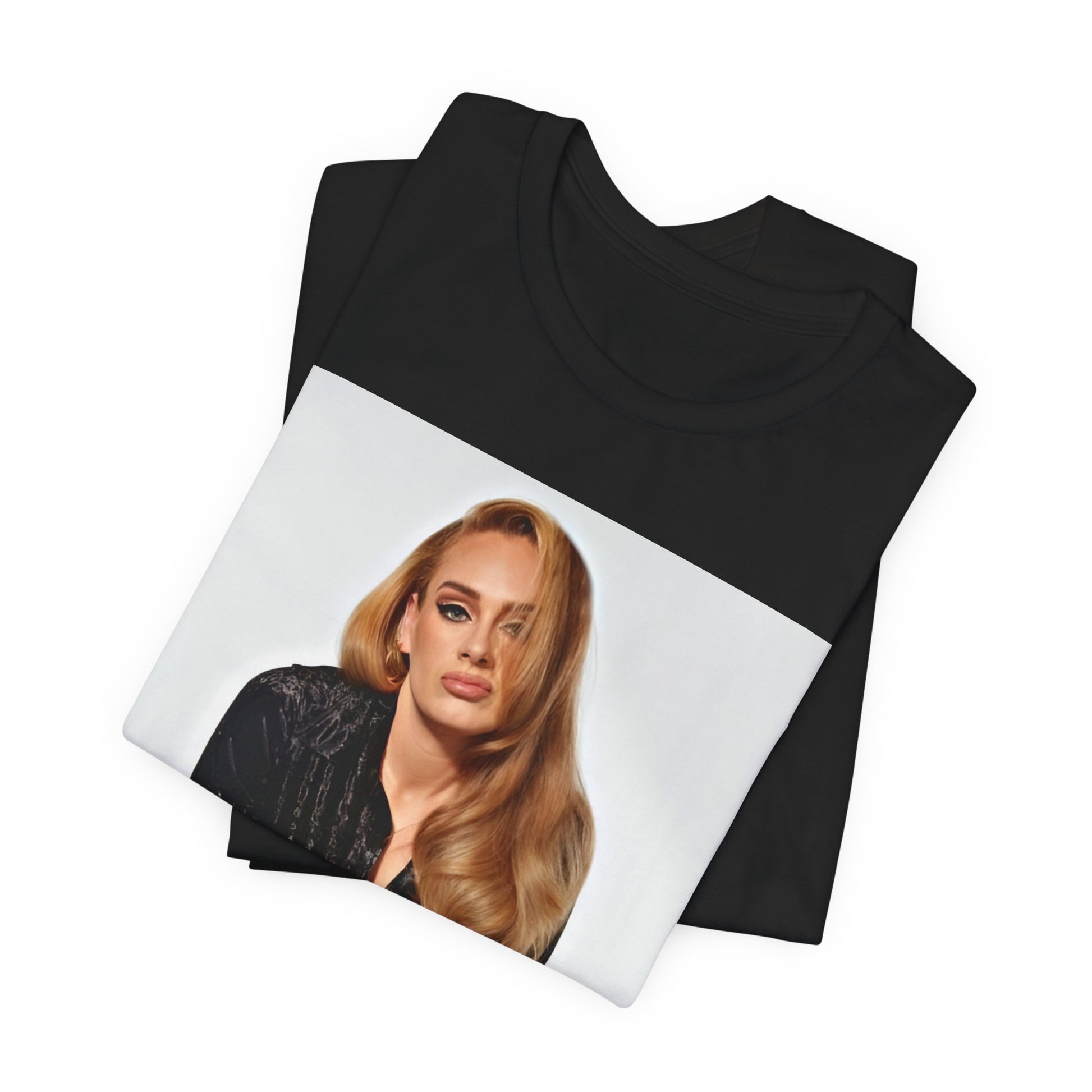 A black graphic t-shirt featuring a portrait of Adele from her iconic blonde era, with her hair styled and her expression poised and elegant.