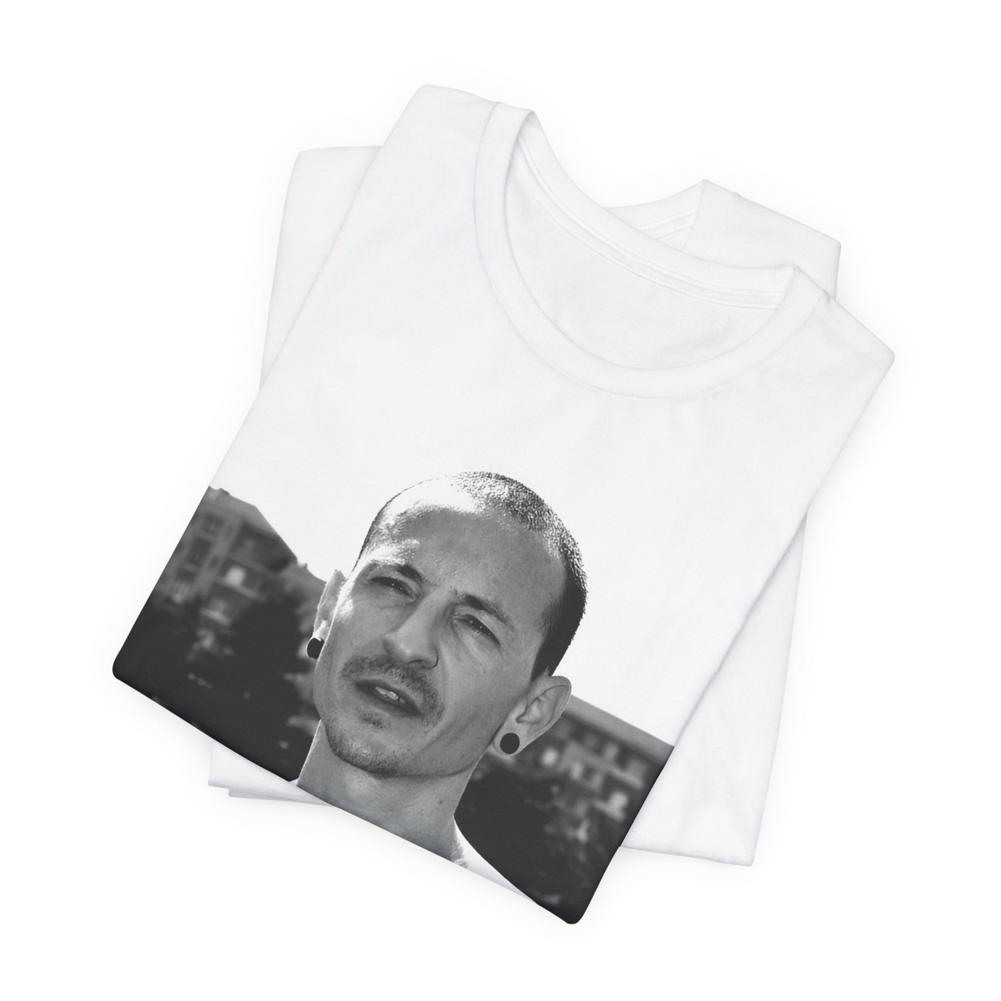 A black graphic t-shirt featuring a black and white graphic or photo portrait of Chester Bennington from Linkin Park.