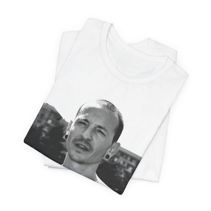 A black graphic t-shirt featuring a black and white graphic or photo portrait of Chester Bennington from Linkin Park.