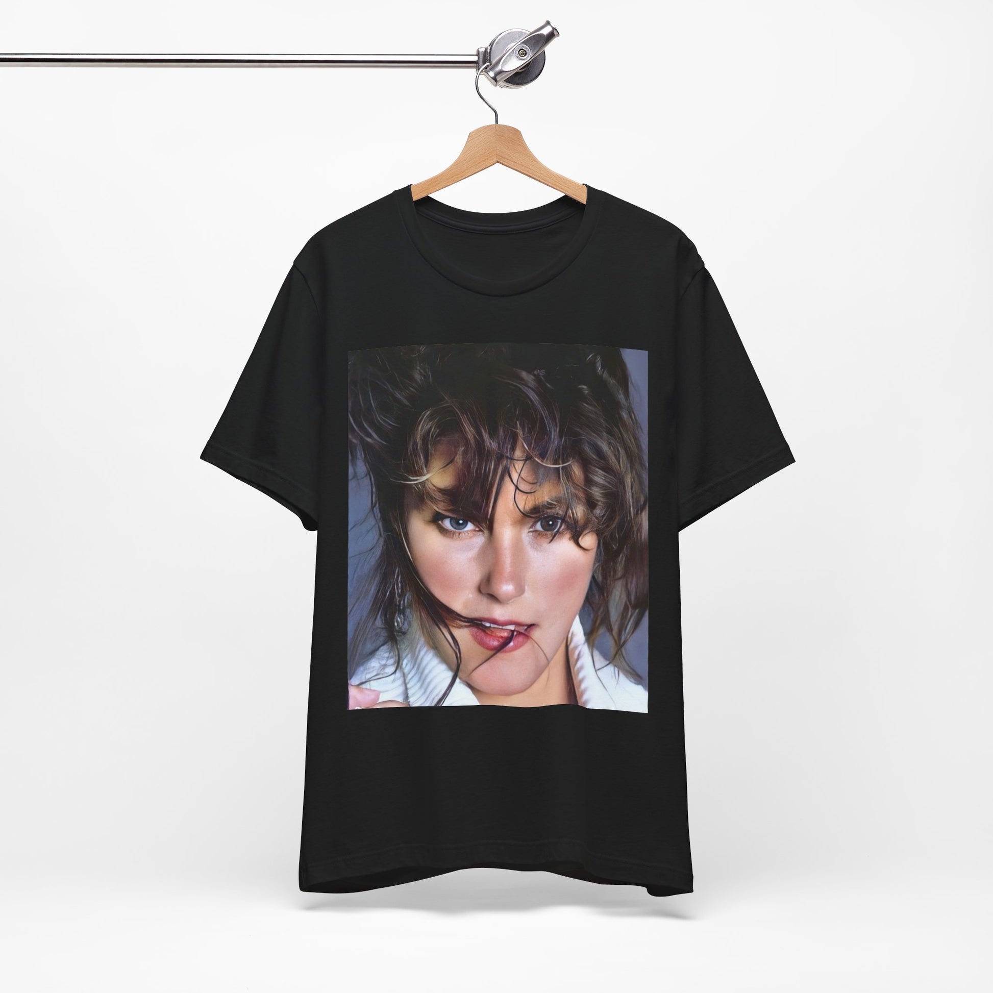 A black graphic t-shirt featuring an 80s style graphic of Laura Branigan.