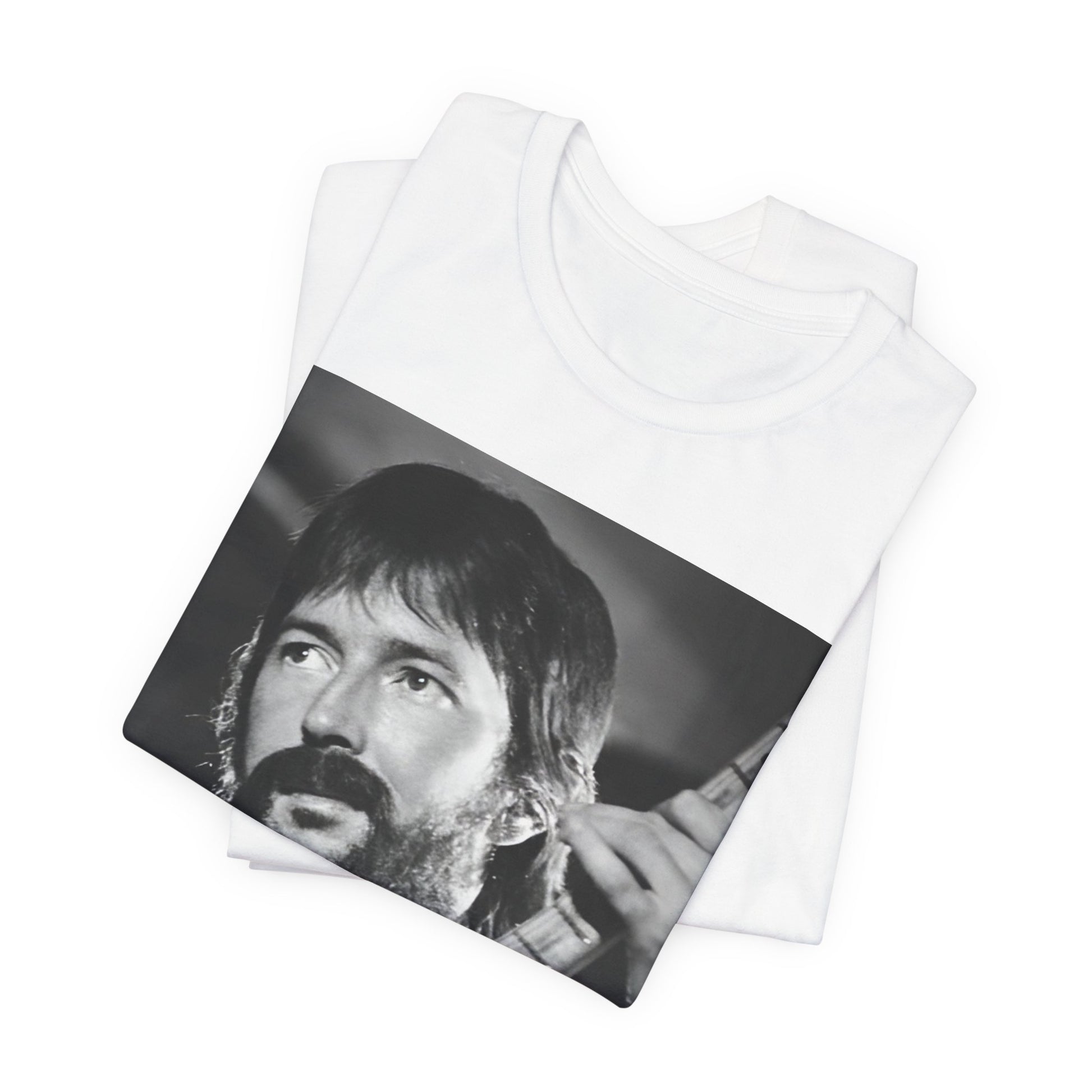 A black graphic t-shirt featuring a graphic of Eric Clapton as an authentic guitar god.