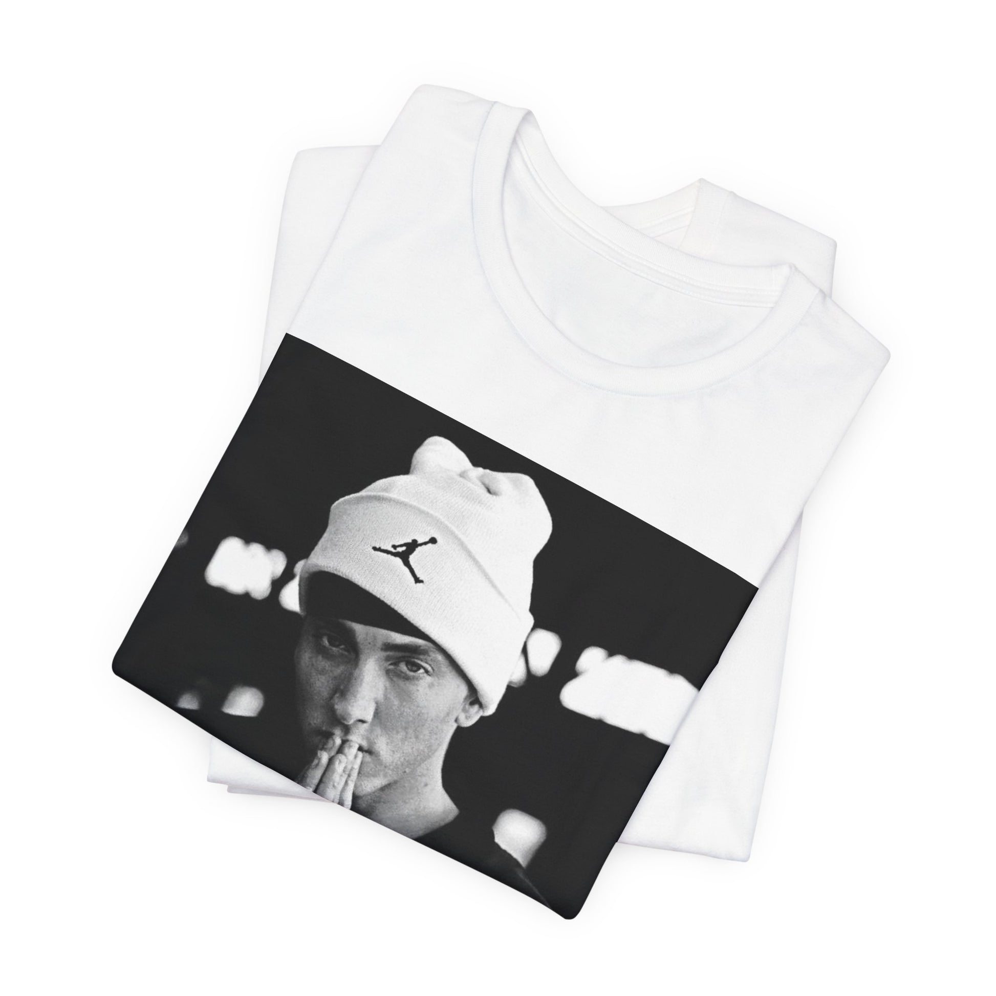 A black graphic t-shirt featuring a black and white portrait photo of Eminem.