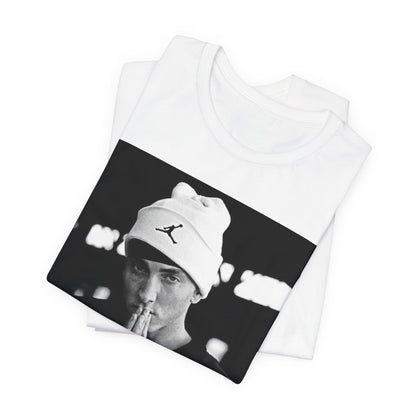 A black graphic t-shirt featuring a black and white portrait photo of Eminem.