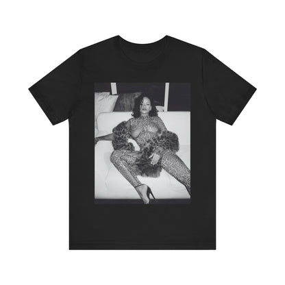 A black graphic t-shirt featuring a black and white, monochrome graphic or photo of Rihanna in a sexy pose.