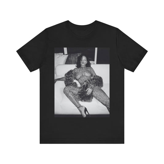 A black graphic t-shirt featuring a black and white, monochrome graphic or photo of Rihanna in a sexy pose.
