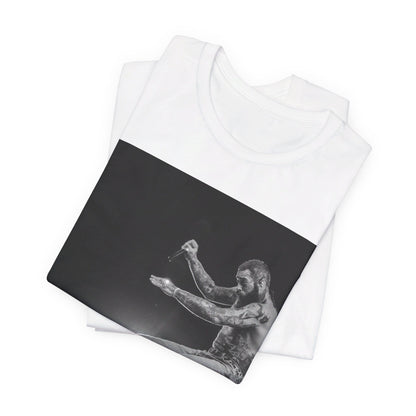 A black graphic t-shirt featuring a vintage graphic or photo of Post Malone performing live.