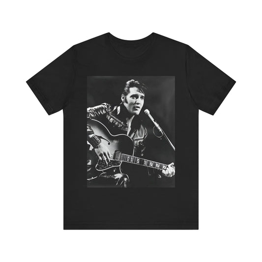 A black graphic t-shirt featuring a graphic related to Elvis Presley's 'Burning Love' song or era.