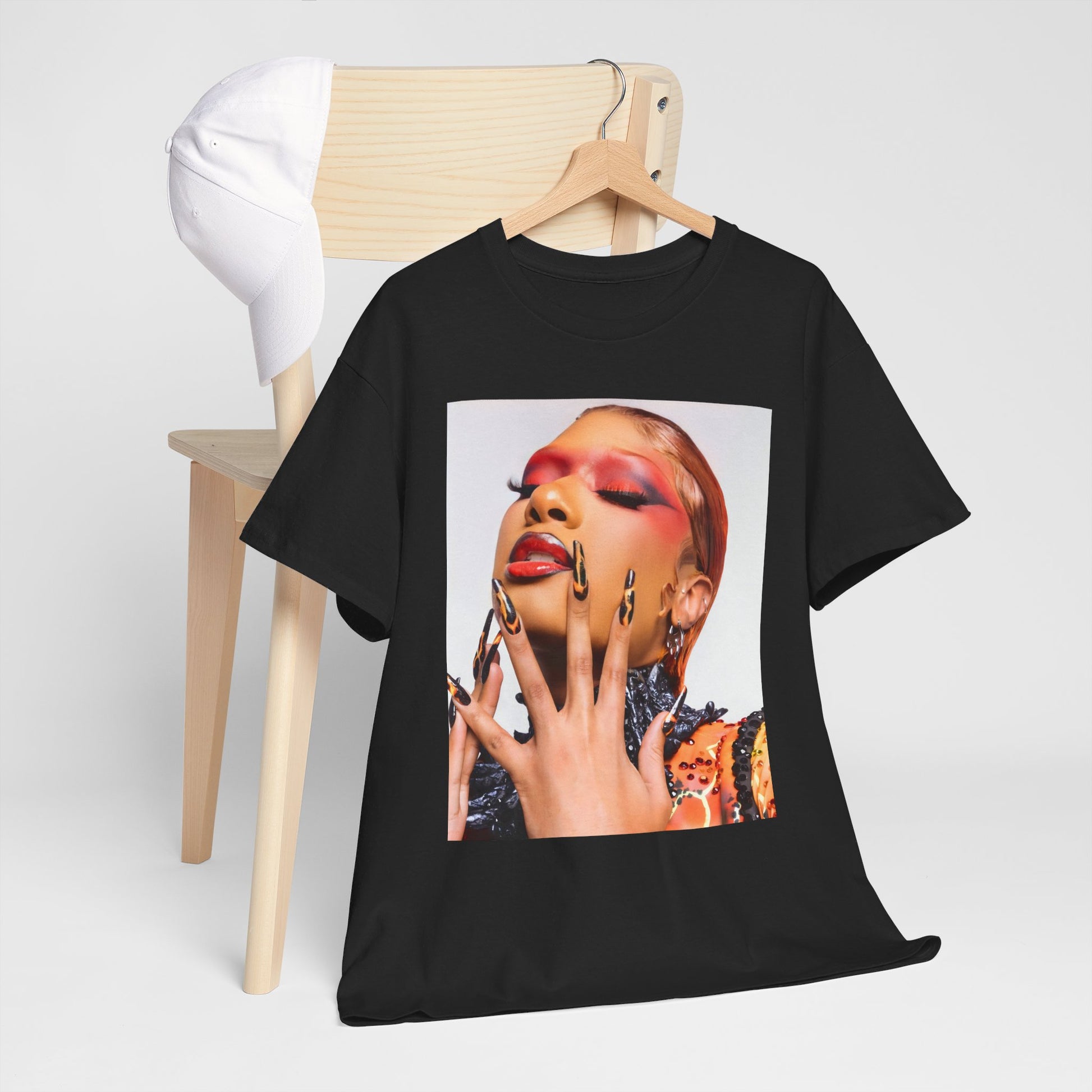 A black graphic t-shirt featuring a graphic related to Megan Thee Stallion's 'WAP' song or era.
