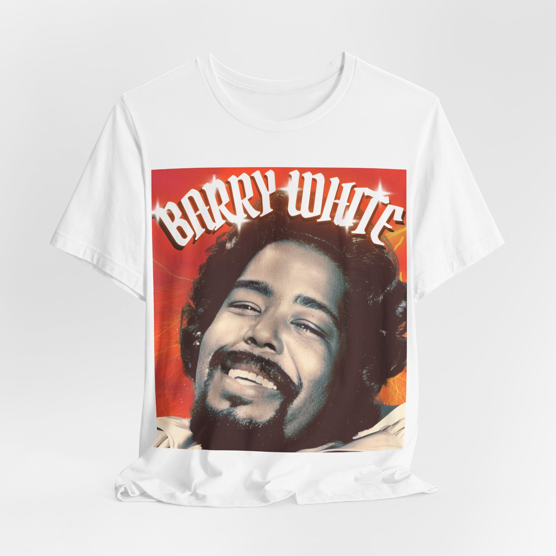 A black graphic t-shirt featuring a graphic of Barry White, emphasizing his iconic soulful presence from the 1970s.