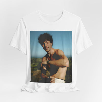 A black graphic t-shirt featuring a graphic of Shawn Mendes with a chill pop star look.