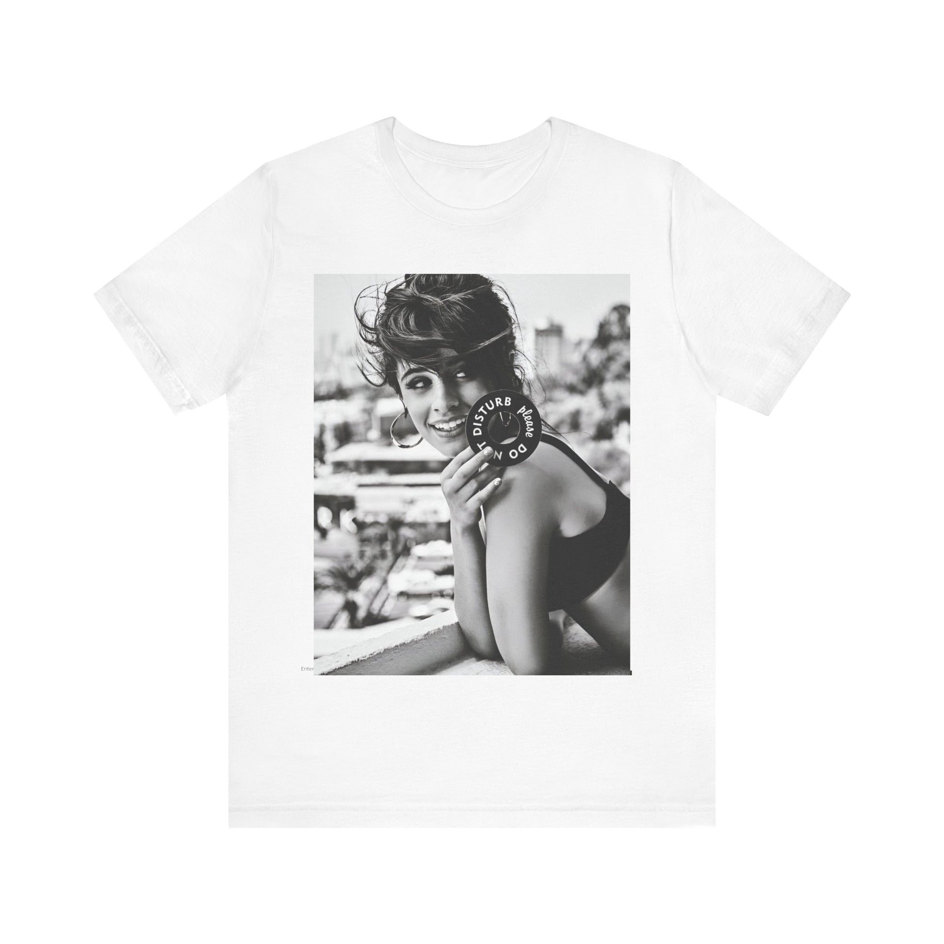 A black graphic t-shirt featuring a black and white photo or graphic of Camila Cabello in an iconic style.