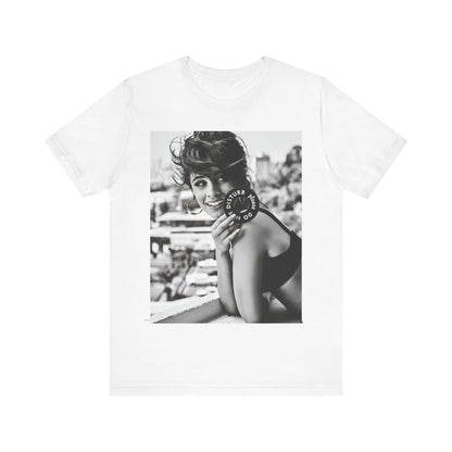 A black graphic t-shirt featuring a black and white photo or graphic of Camila Cabello in an iconic style.
