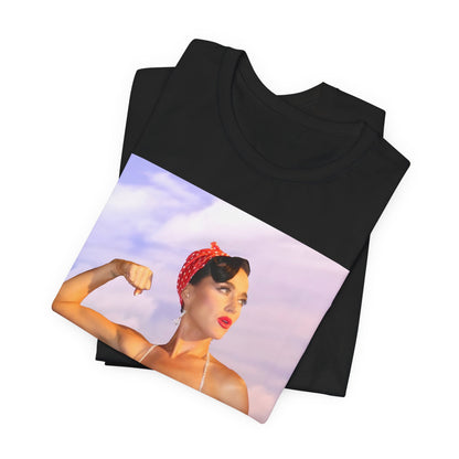 A black graphic t-shirt featuring a bold graphic of Katy Perry as a pop superstar.