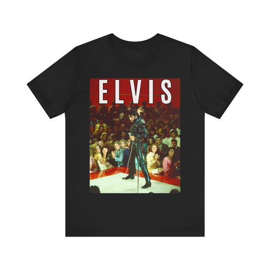 A black graphic t-shirt featuring a retro graphic related to an Elvis Presley special concert.