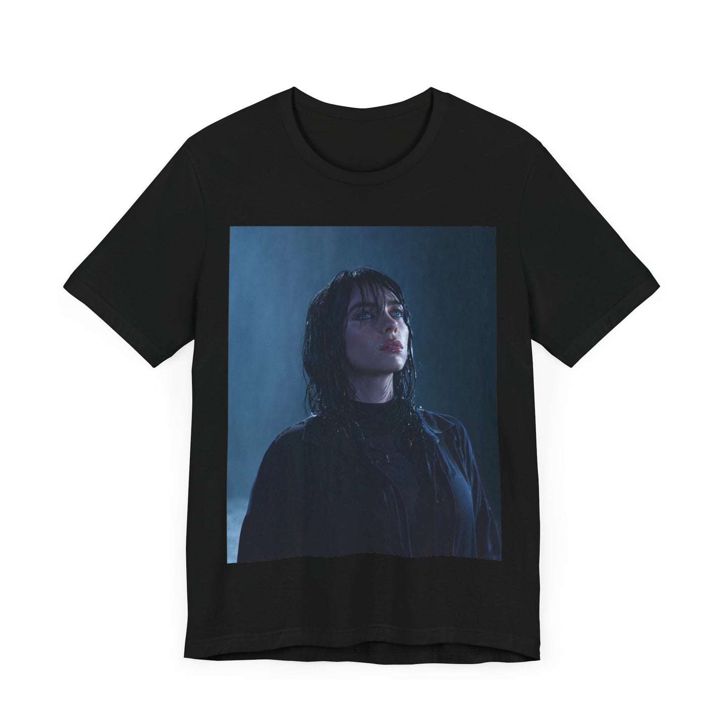 A direct, powerful portrait of Billie Eilish, embodying the 'HIT ME HARD AND SOFT' album era, printed on a graphic t-shirt.
