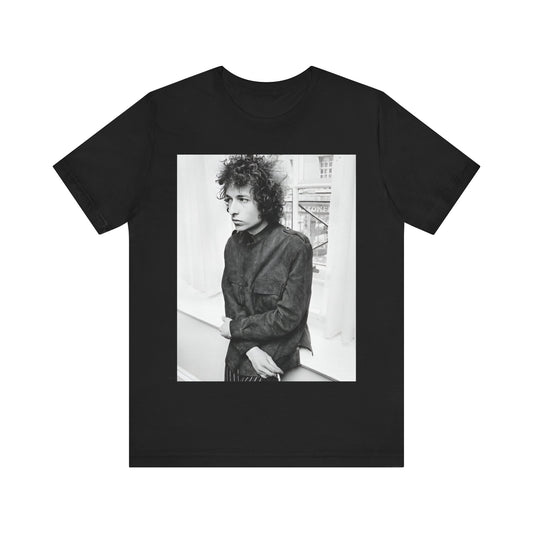 A black graphic t-shirt featuring a classic Americana-style graphic of Bob Dylan, possibly with folk elements.