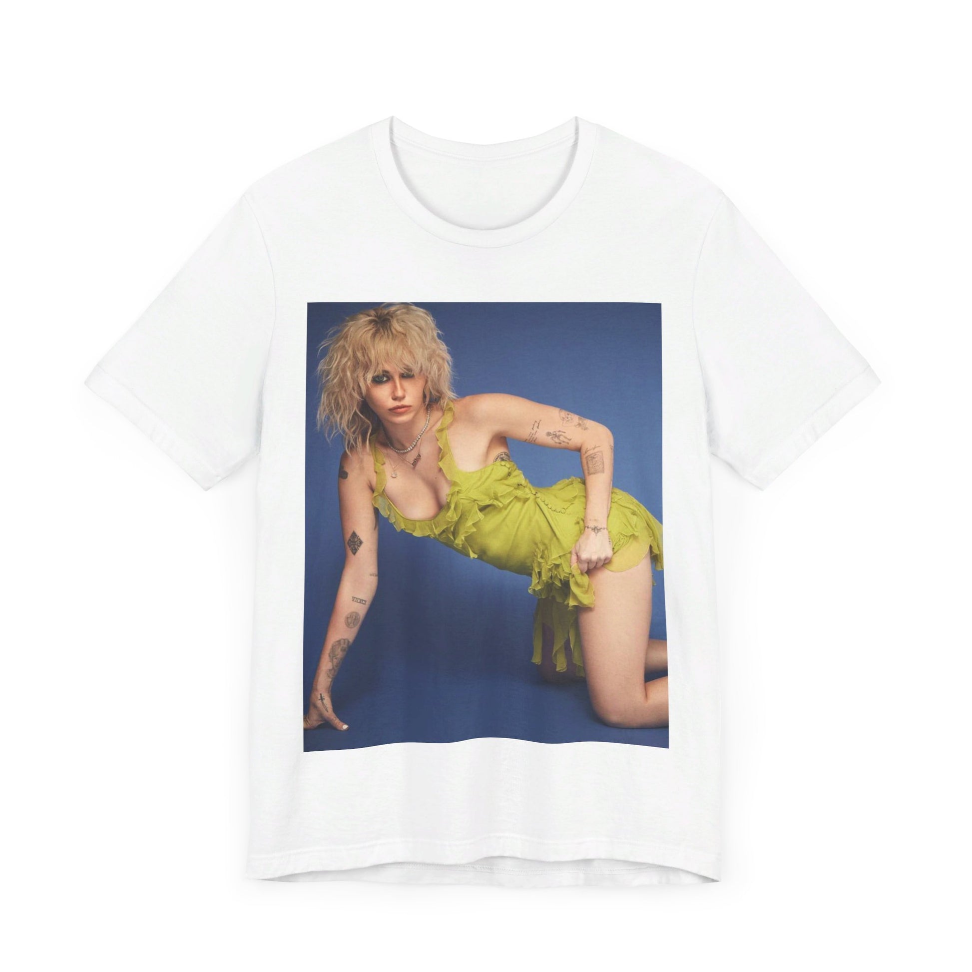 A black graphic t-shirt featuring a graphic of Miley Cyrus as a global pop phenomenon.