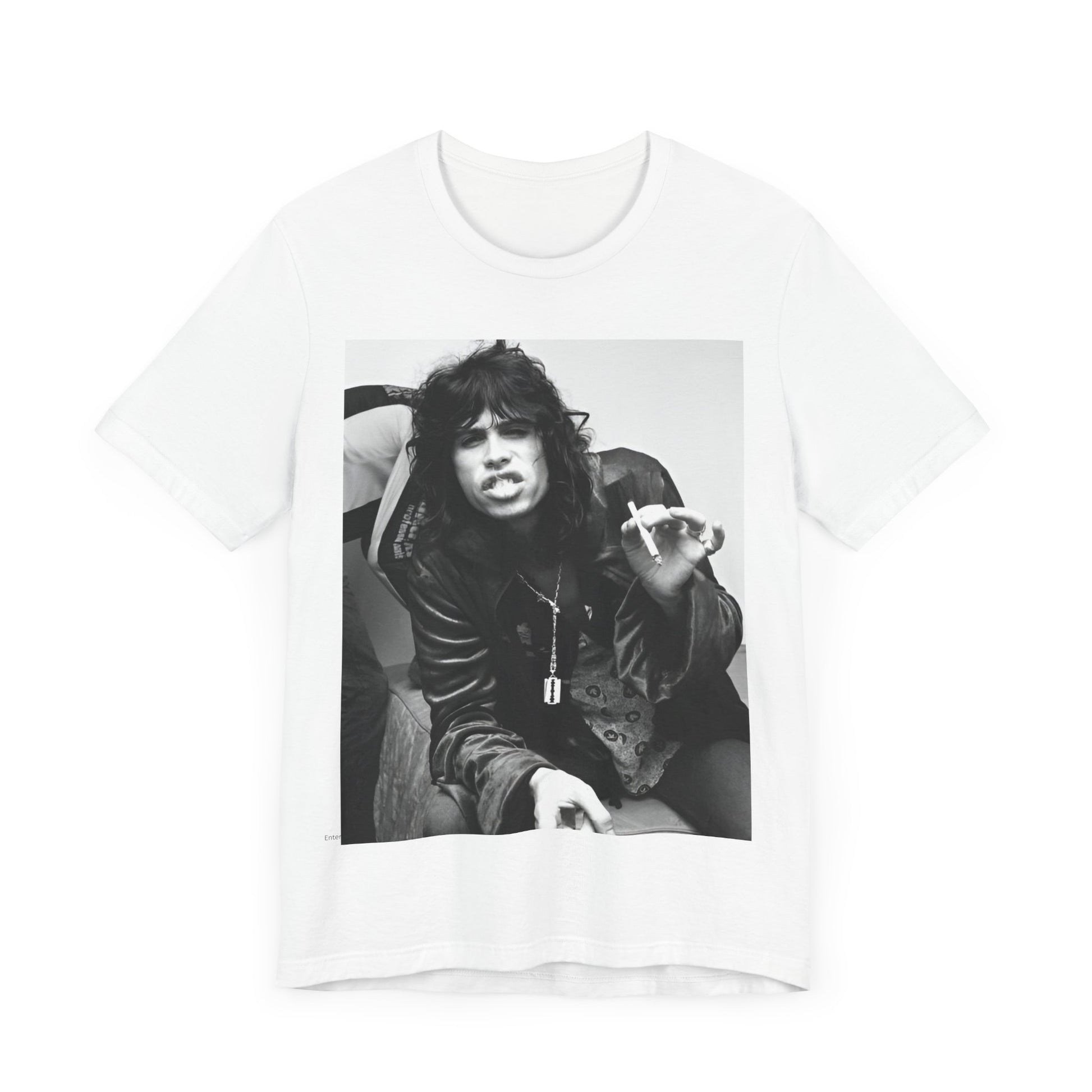 A black graphic t-shirt featuring a retro 70s photo of Aerosmith band members lounging in leather, exuding a cool, classic rock vibe.
